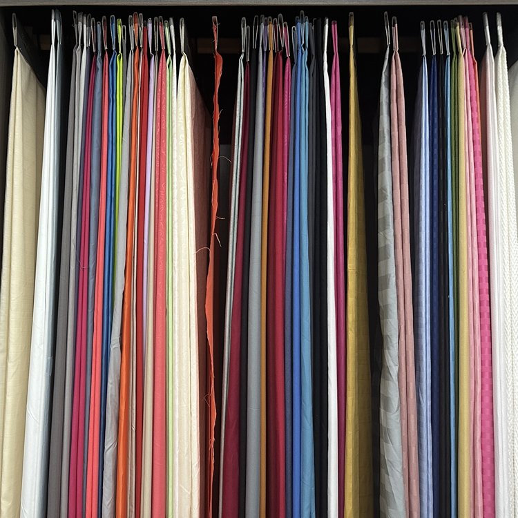 Manufacturer solid peach skin 100%polyester microfiber embossed stripes micro fiber fabric for sheet