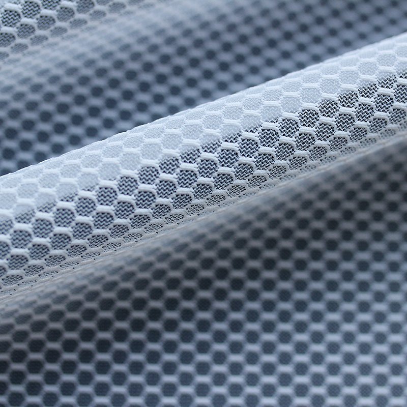 Wholesale high quality cheap warp knitting polyester honeycomb filament yarn stiff mesh net fabric knit for sports shoes upper