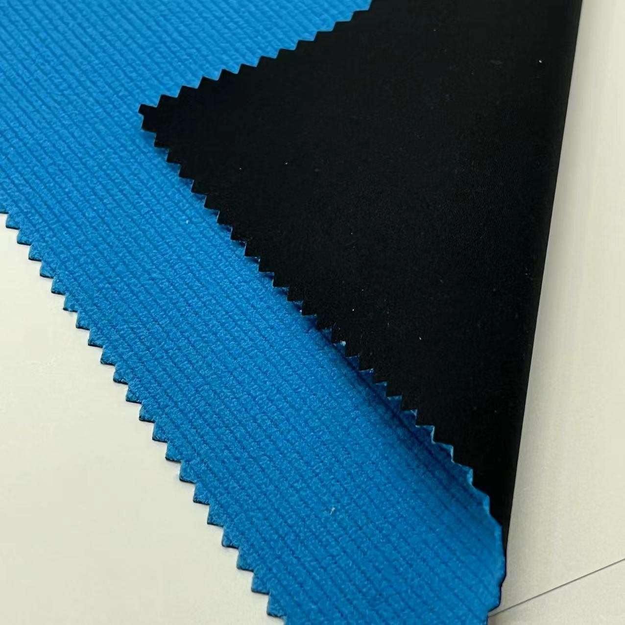 Fashion 100% Polyester Softshell High Elastic Yarn Bonded TPU Bonded Polar Fleece Fabric For Clothes