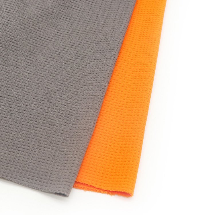 Dry fit basketball jersey 100% polyester dyed waffle mesh jacquard knitting t-shirts fabric for sports clothing
