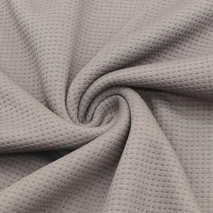 Dry fit basketball jersey 100% polyester dyed waffle mesh jacquard knitting t-shirts fabric for sports clothing