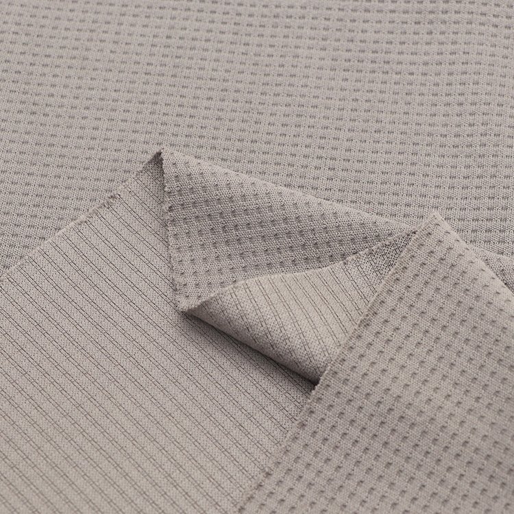 Dry fit basketball jersey 100% polyester dyed waffle mesh jacquard knitting t-shirts fabric for sports clothing