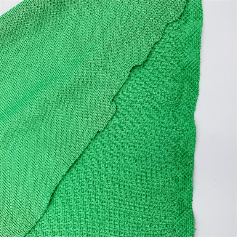 100% polyester moisture absorbing and sweat wicking quick drying pique fabric knitted spandex for casual and sportswear