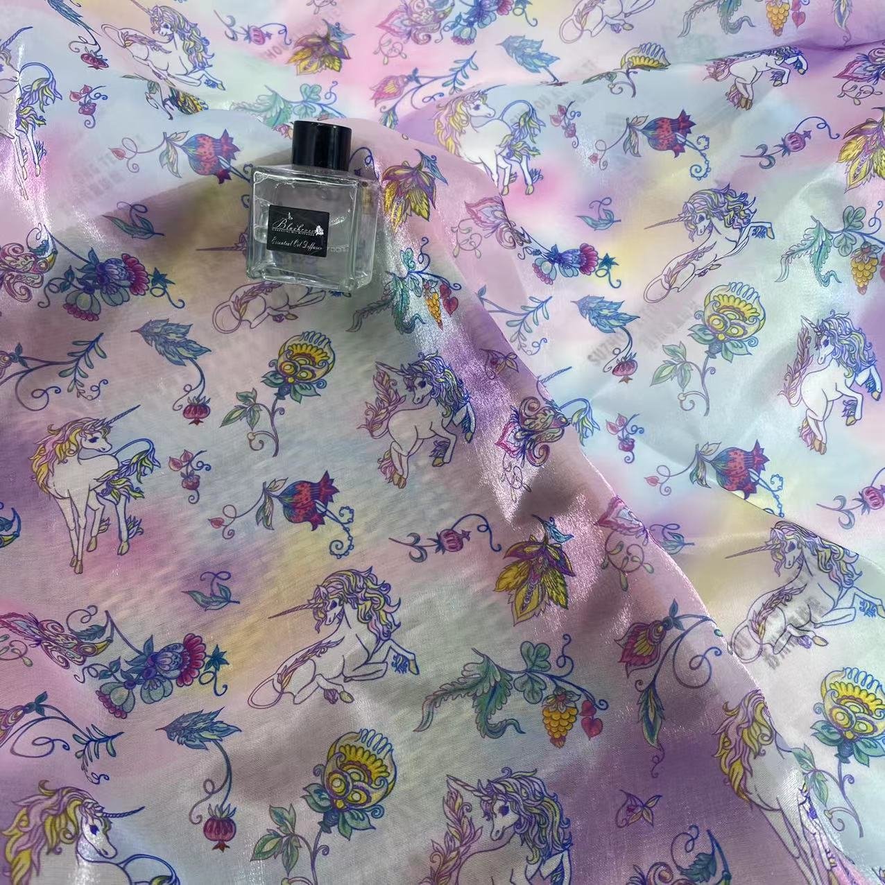 Hot selling polyester soft shiny cute design rainbow background liquid organza fabric for kids dress