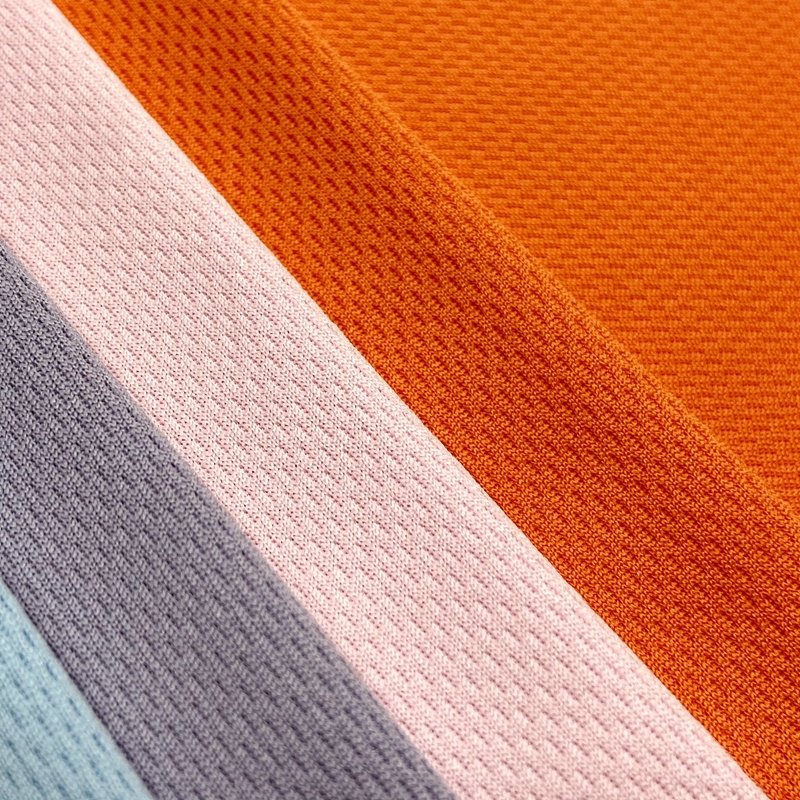 Breathable 100 polyester knitted sublimation custom bird eye mesh eyelet sports fabric for basketball wear
