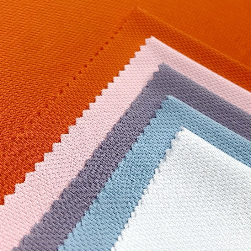 Breathable 100 polyester knitted sublimation custom bird eye mesh eyelet sports fabric for basketball wear