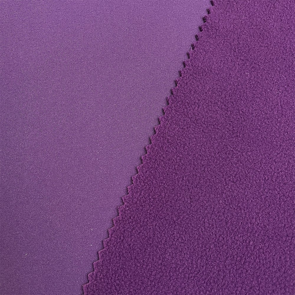 Factory Top Sale Waterproof Polyester Bonded Polar Fleece Knit Softshell Fabric Outdoor Jacket Fabric For Sportswear Garment
