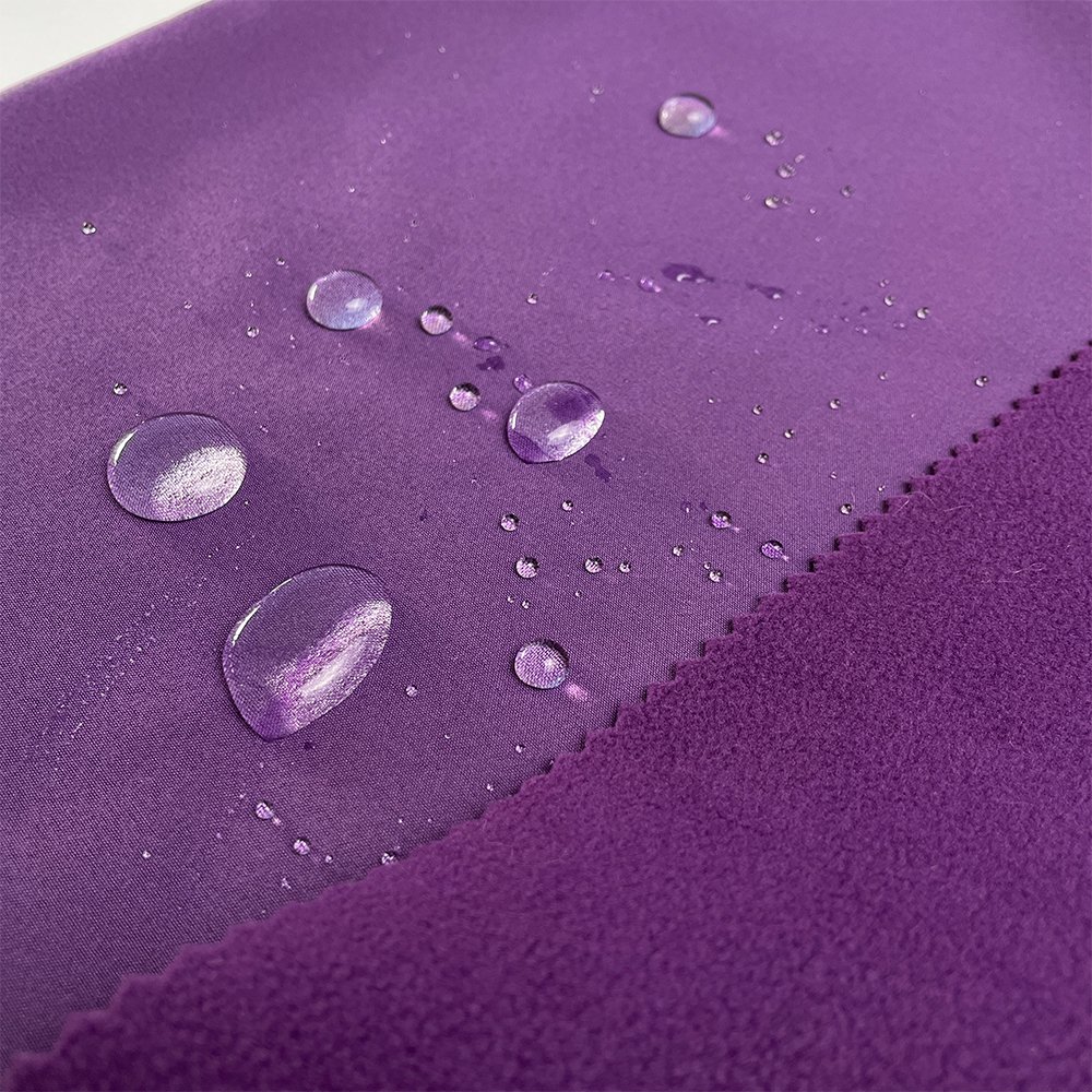 Factory Top Sale Waterproof Polyester Bonded Polar Fleece Knit Softshell Fabric Outdoor Jacket Fabric For Sportswear Garment