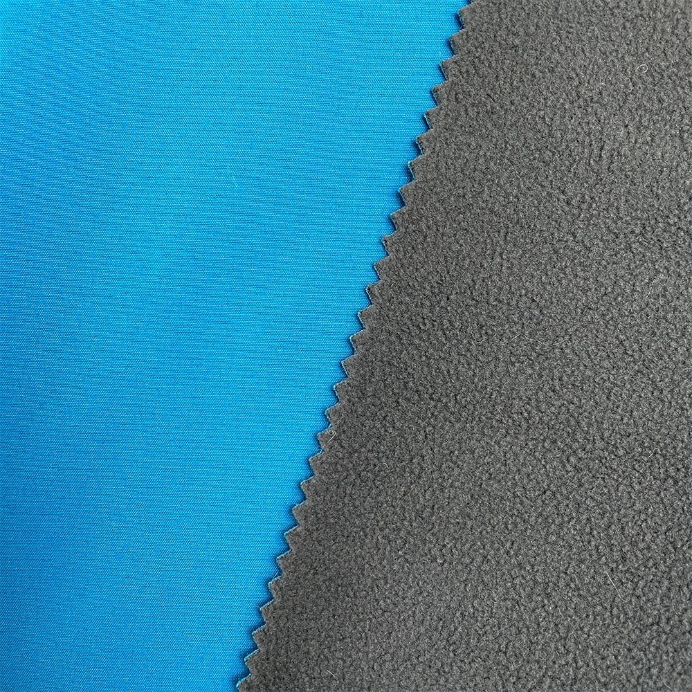 Factory Top Sale Waterproof Polyester Bonded Polar Fleece Knit Softshell Fabric Outdoor Jacket Fabric For Sportswear Garment