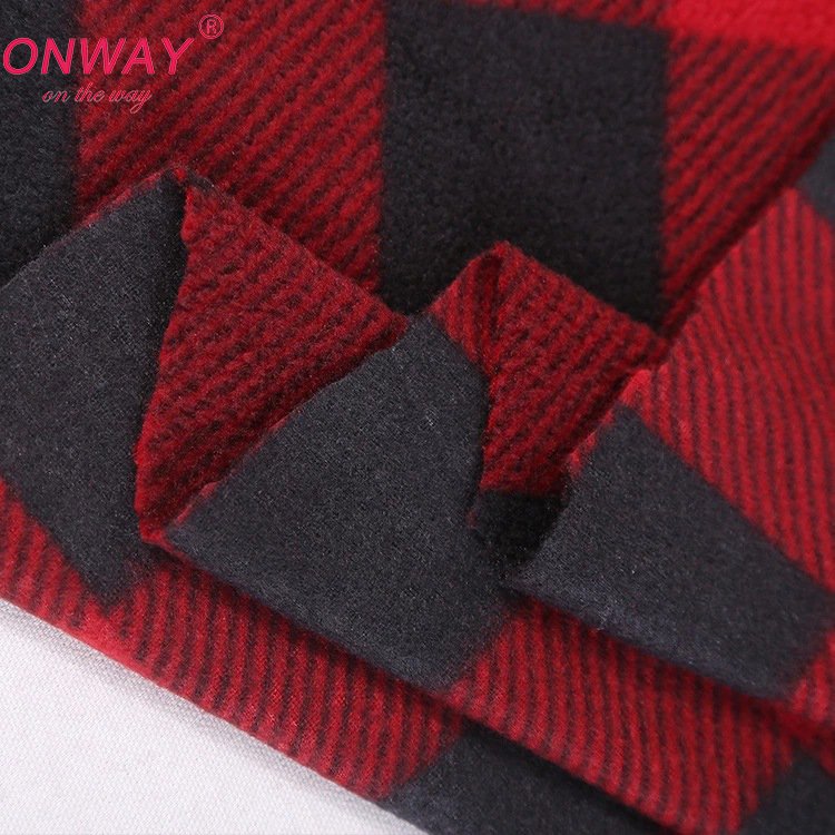 2023 Hot sale printed knitted plaid brushed single sided anti pilling polar fleece fabric for autumn and winter