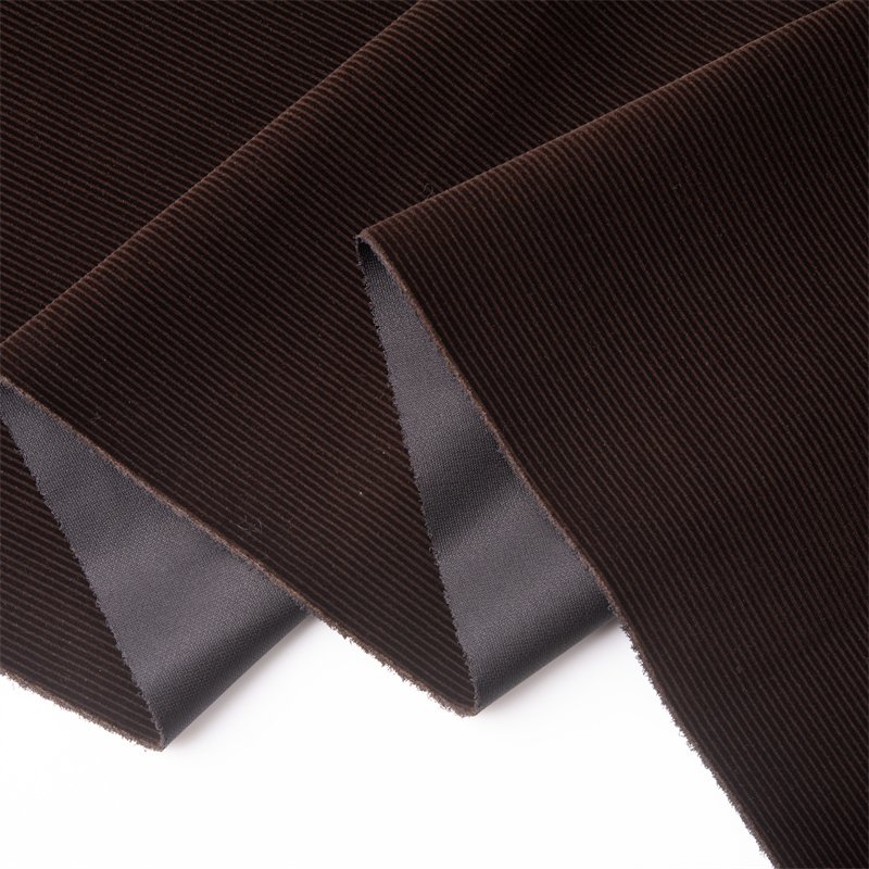 Fabric Textile Raw Material 100% Polyester Spot Flocking Clothing Fabric For Garment
