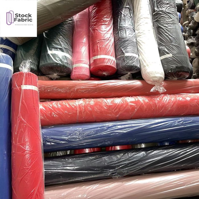 Free samples reliable quality woven stock lot 100% polyester bubble plain dyed fabric for garment