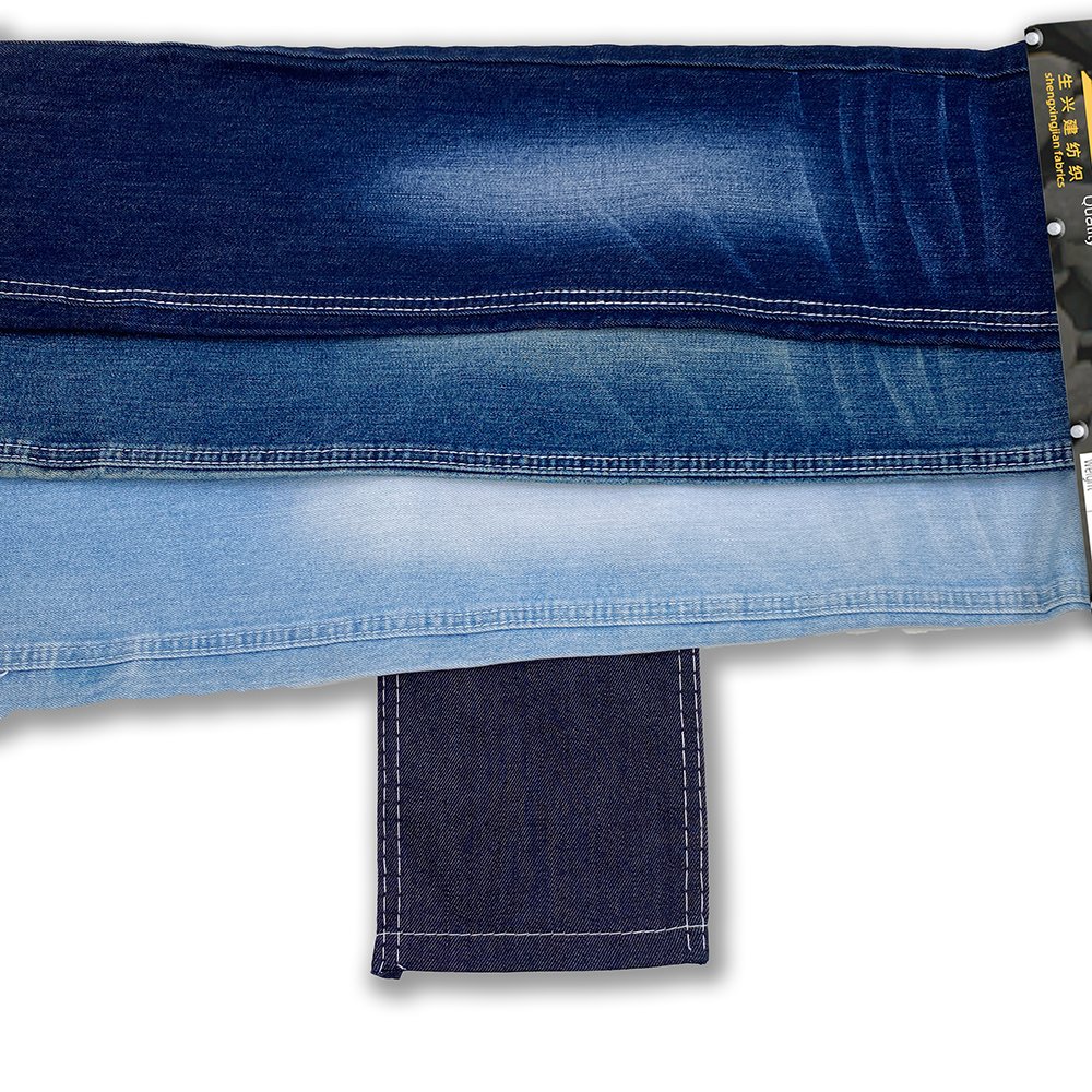 New design good quality denim fabric China factory cheap wholesale 11oz jeans clothing fabric slub cotton