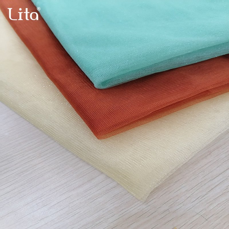 Fashion Hot Sale 100% Polyester Flexible Glitter Tulle Mesh Invisible Mesh Fabric