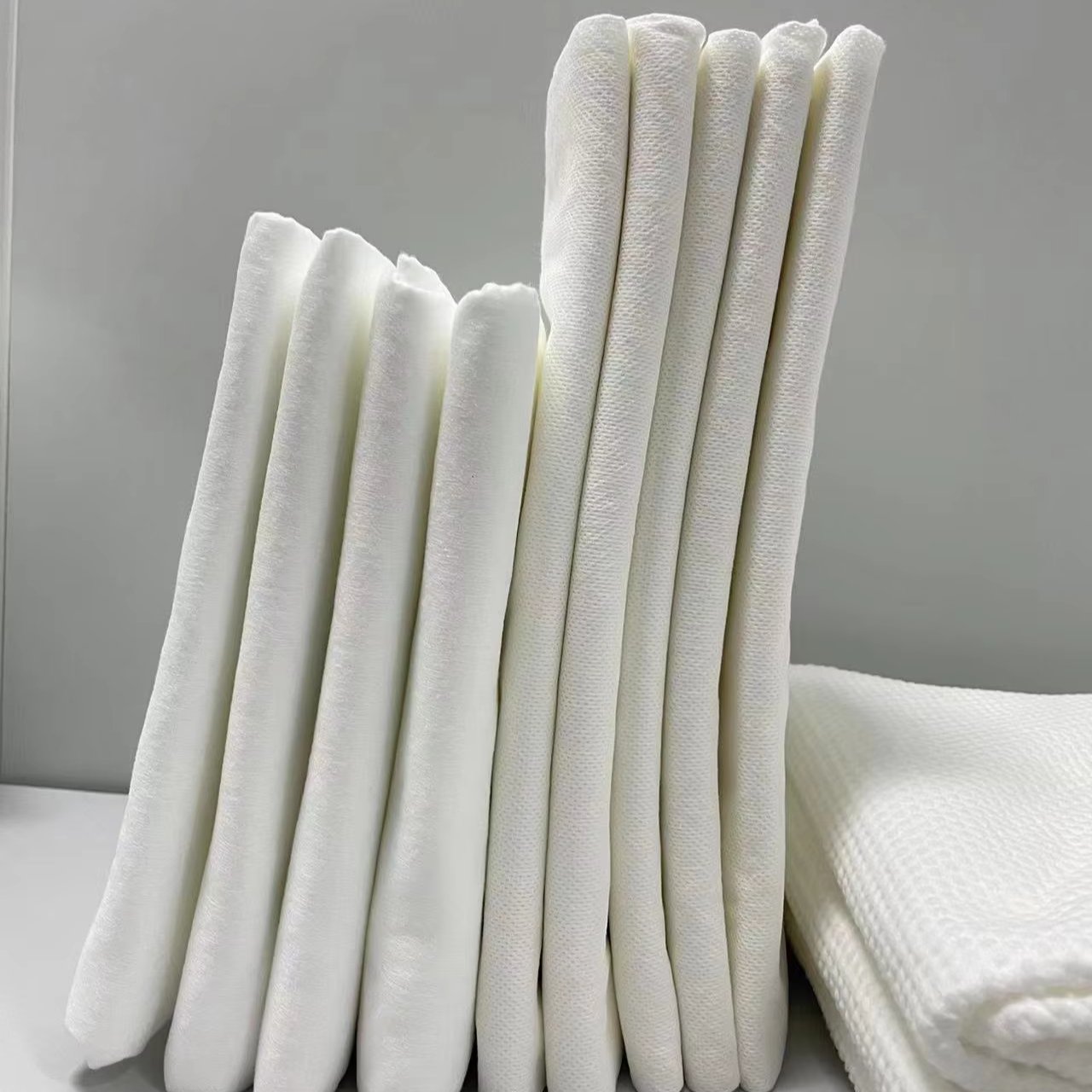 Professional Supply Spunlace Nonwoven Fabric For Wet Tissue Bamboo Fiber Spunlace Nonwoven Plain Spunlace Nonwoven