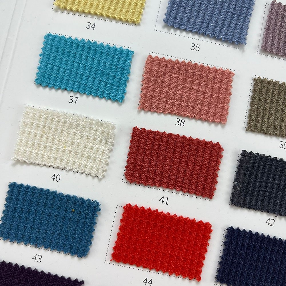 In stock 100 polyester 220g knitted waffle fabric for clothing T-shirts, home pet clothing