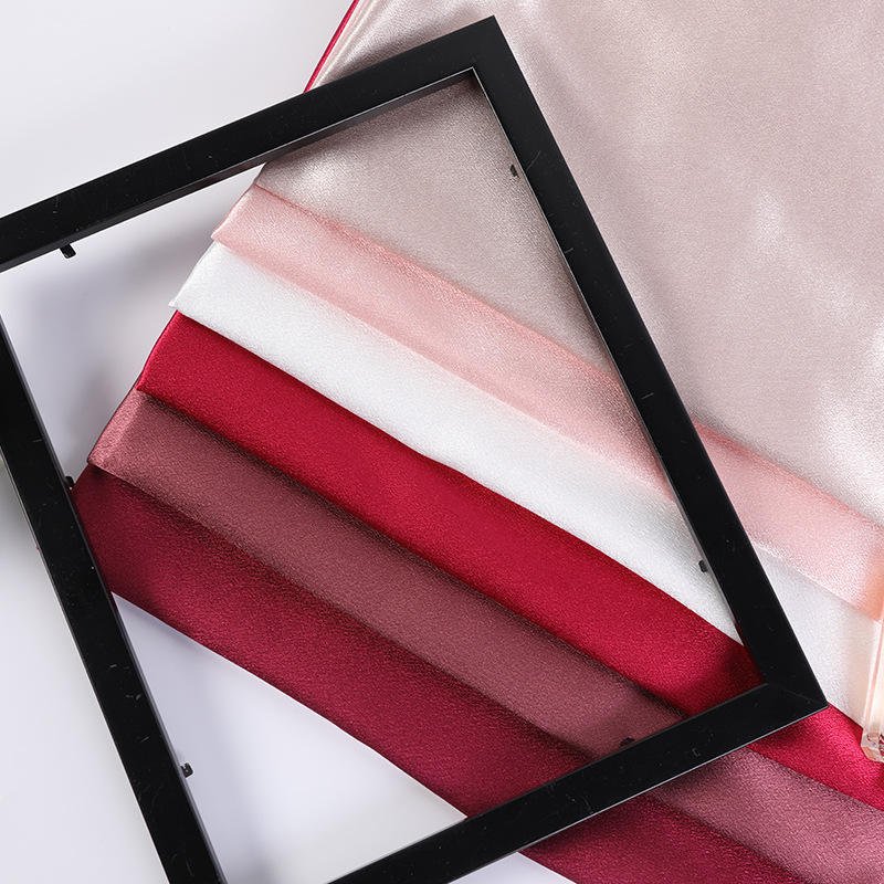 High quality Wholesale COLORED DOBBY Satin Fabric XITONG TEXTILE woven polyester satin FABRIC Rolls for PAJAMAS evening dress