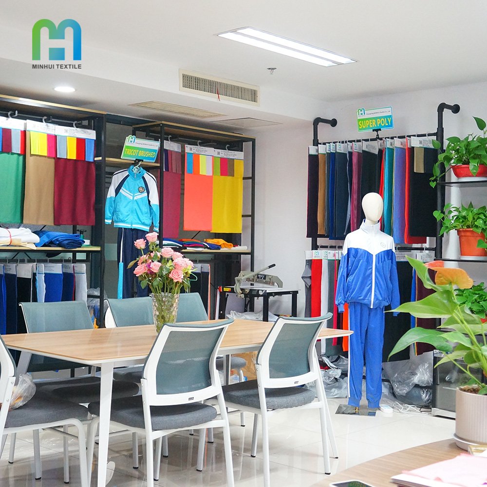 Factory low price semi-gloss 230gsm knitted sportswear tricot fabric polyester super poly fleece tricot tracksuit fabric