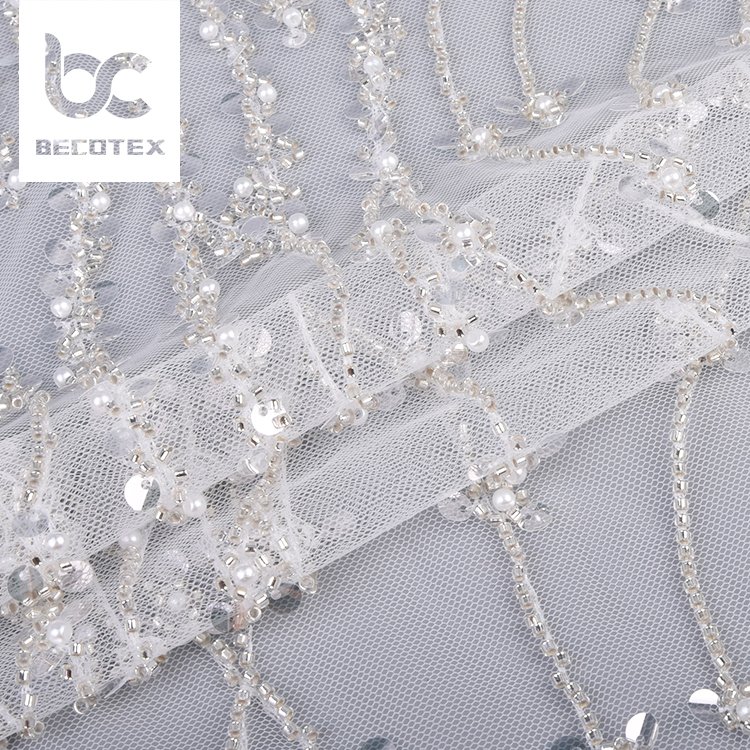 High quality white bridal tulle lace fabric high-end embroidery beaded sequin bridal wedding dress lace fabric