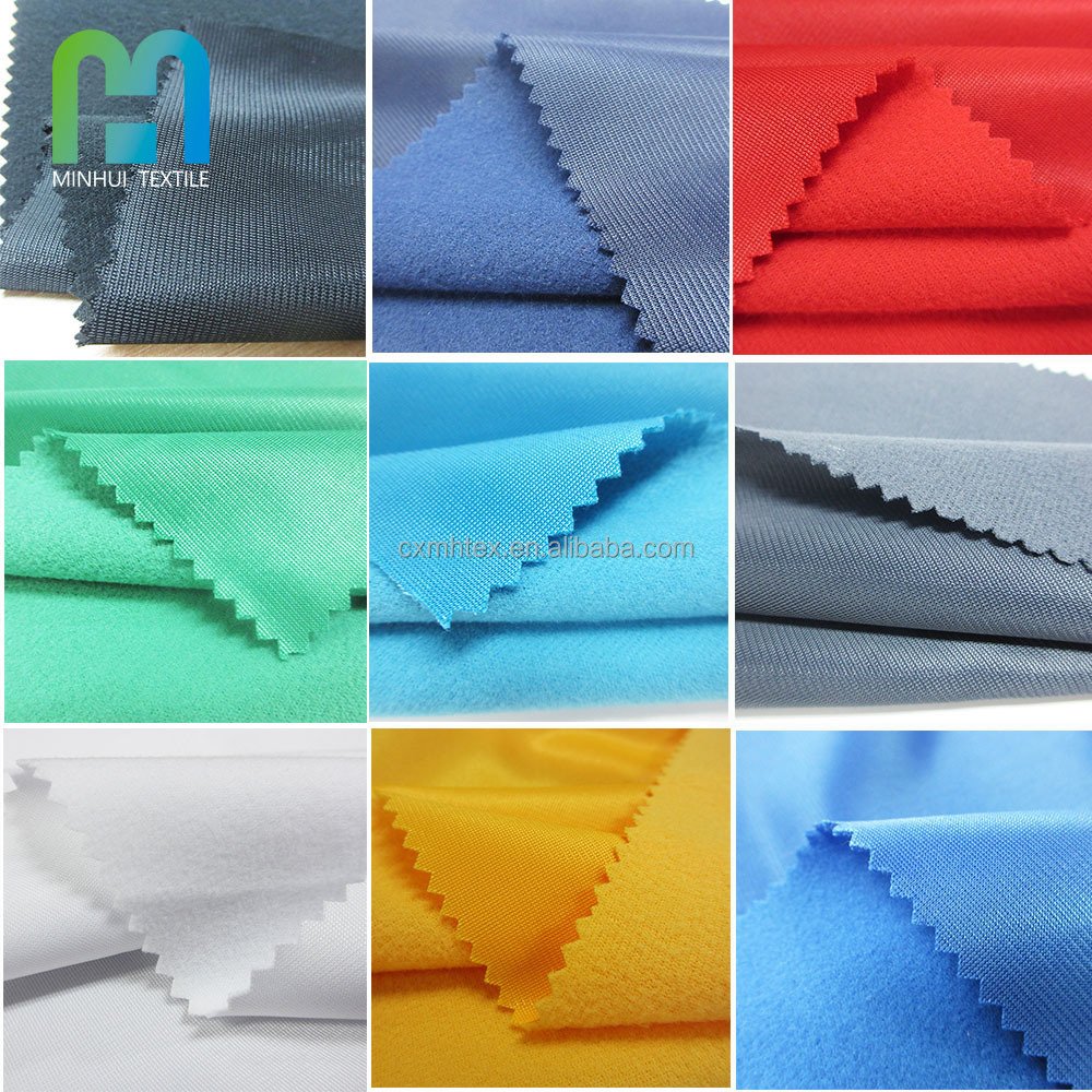 Factory tracksuit material 200gsm tricot super poly velour fabric manufacturer for team training football wear soccer jersey