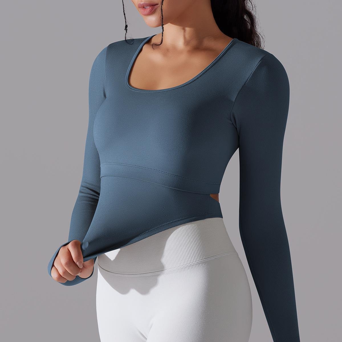 New Arrival Seamless Knitted Solid Color Split Hollow Ribbed Sports Yoga Long-sleeved With Chest Pad Fitness Crop Top For Women