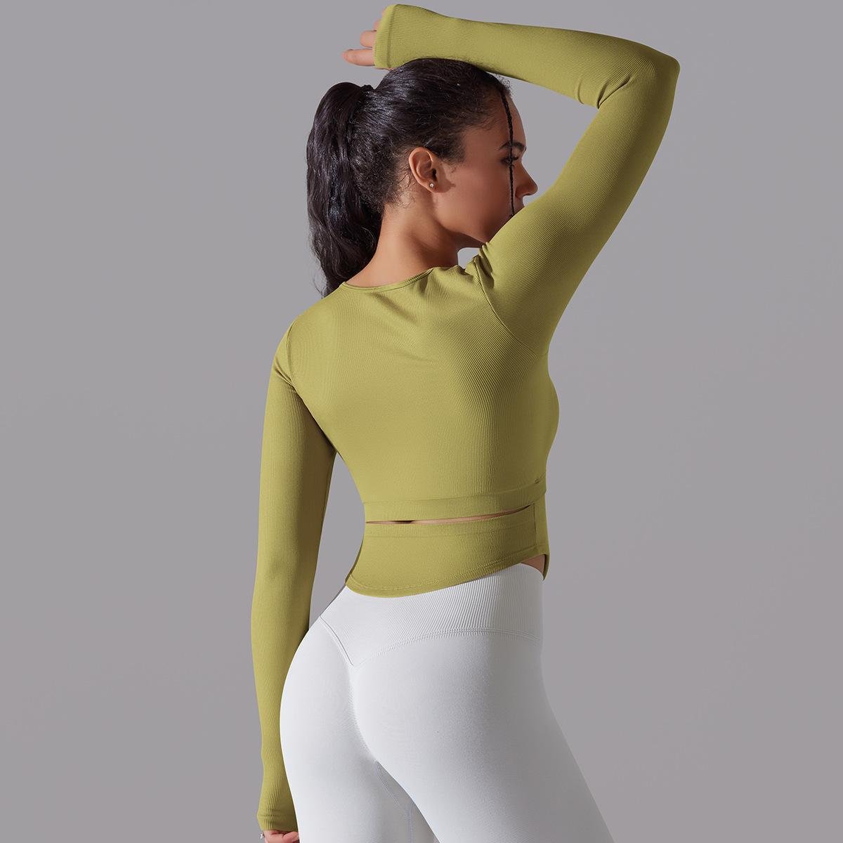 New Arrival Seamless Knitted Solid Color Split Hollow Ribbed Sports Yoga Long-sleeved With Chest Pad Fitness Crop Top For Women