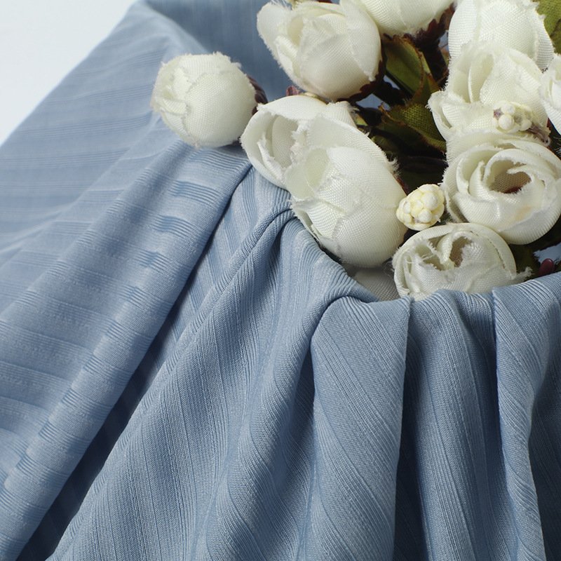 OEM 160cm 230 Gsm 90%Nylon 10%Spandex pit ice silk nude four-sided elastic knitted ribbed fabric