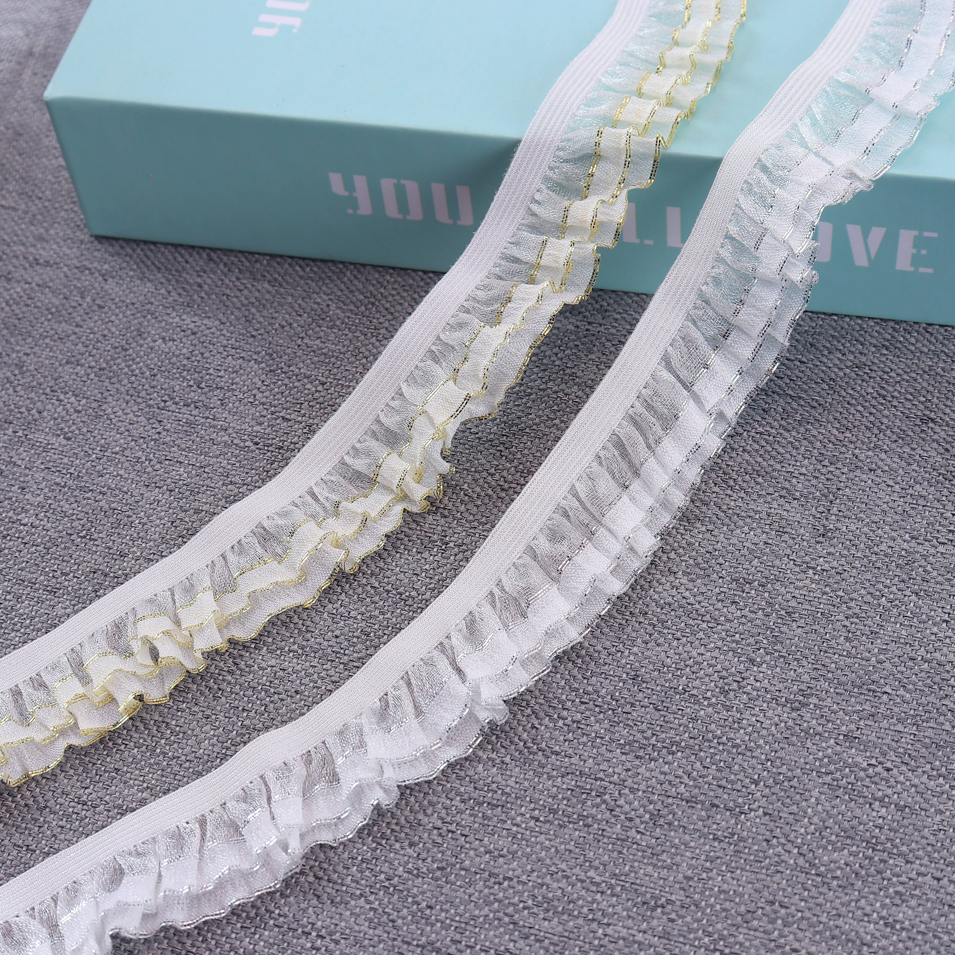 Wholesale of 2.5cm argent wire decorative lace webbing and gold wire elastic band for clothing by manufacturers
