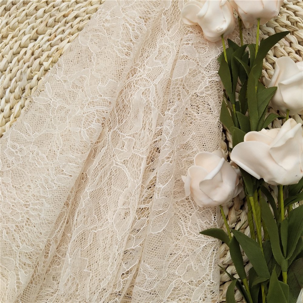 Factory direct sale of low price inventory baby pink lace fabric for dress