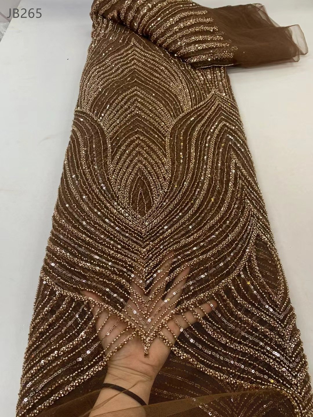 New design bridal heavy lace embroidery fabrics wedding dress low price crystal beaded lace fabric for party dress