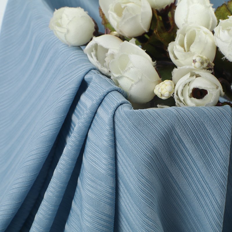 OEM 160cm 170 Gsm 88%Nylon 12%Spandex pit ice silk nude four-sided elastic knitted ribbed fabric