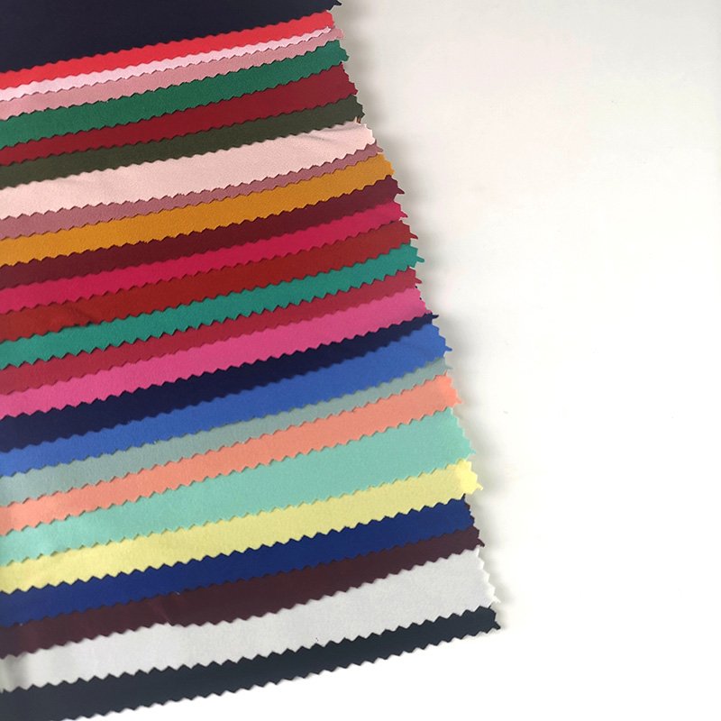PERU TELA PIEL DE DURAZNO DTY PEACH SKIN cheap fabric spandex brushed jersey fabric solid knitted textile for dress