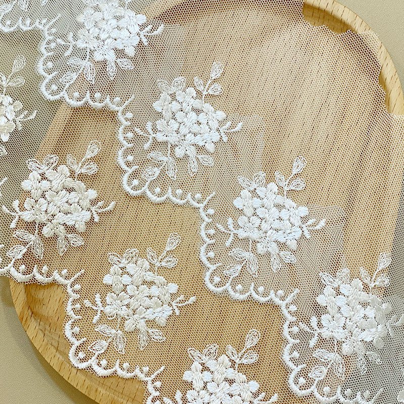wholesale Manufacturers supply polyester silk plum embroidery mesh lace spot