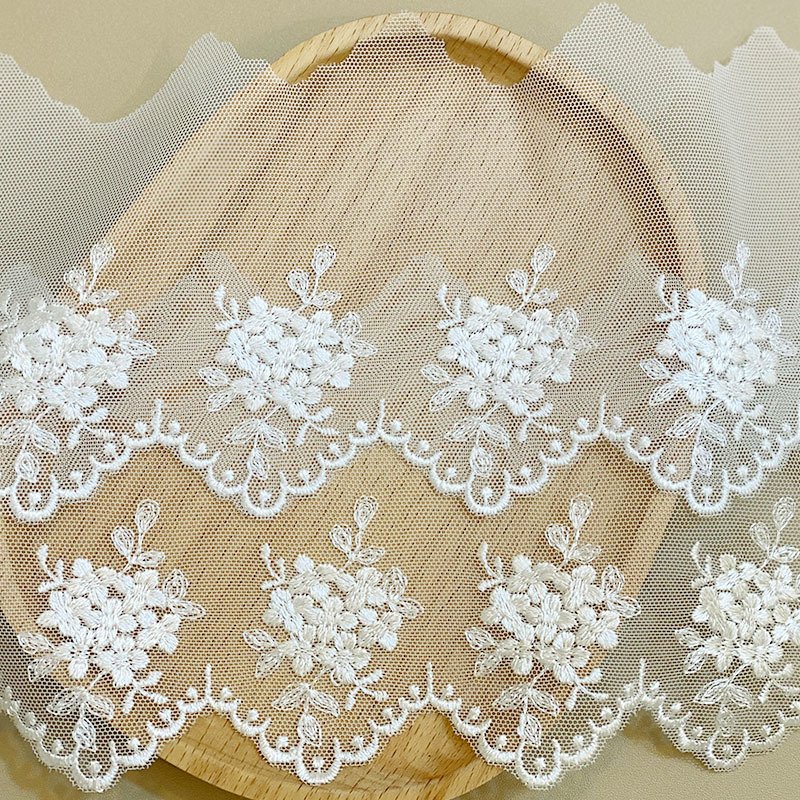 wholesale Manufacturers supply polyester silk plum embroidery mesh lace spot