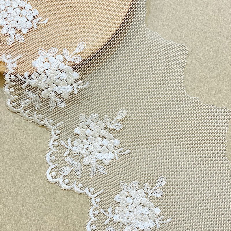 wholesale Manufacturers supply polyester silk plum embroidery mesh lace spot