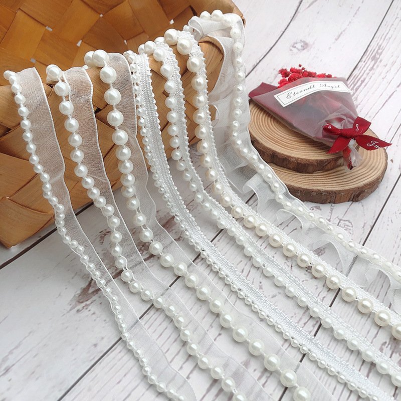 New design hand made pearl 3d beaded lace fabric for wedding dress embroidered flower pearl tulle embroidery lace