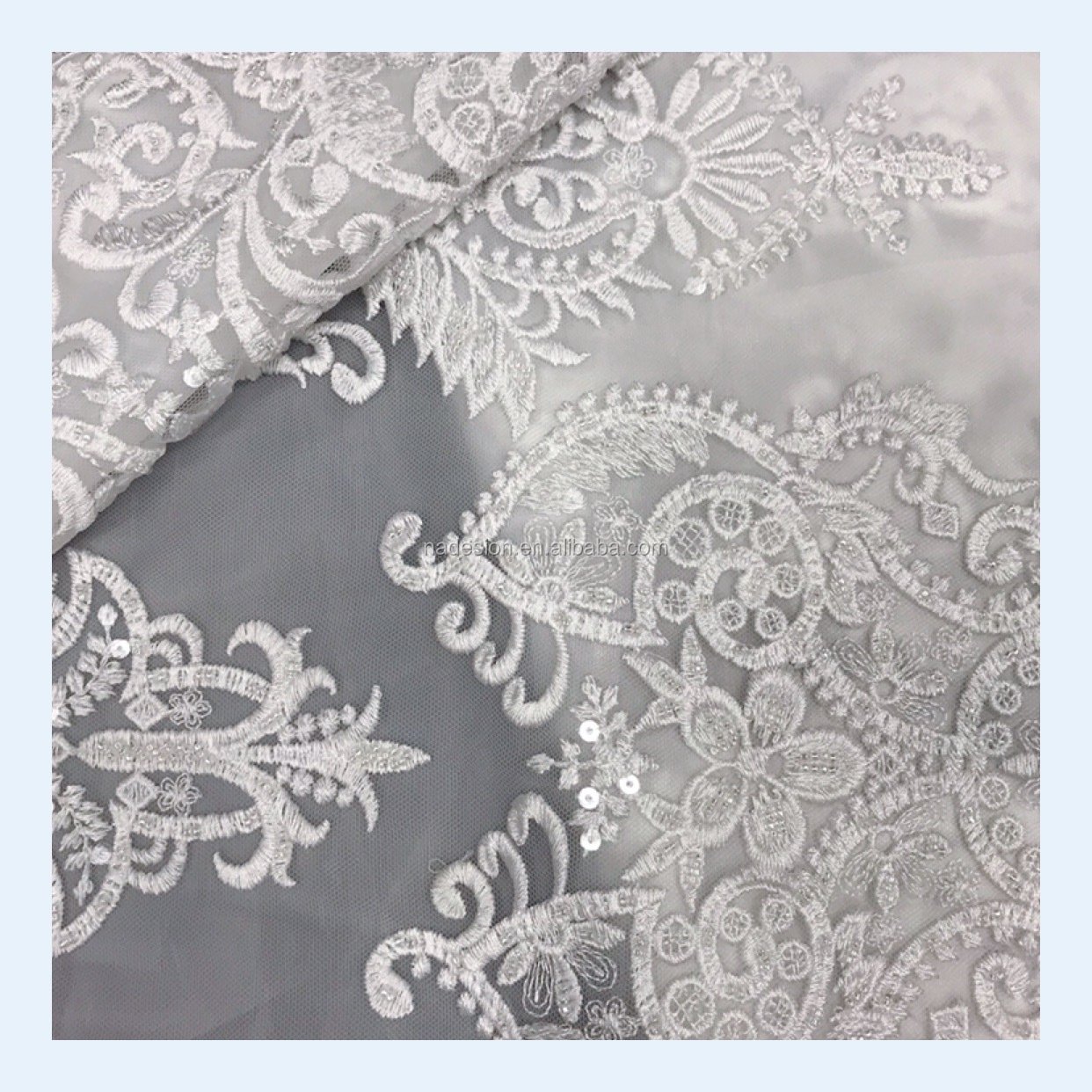 New wholesale white sequins beaded embroidery lace. Bridal gown sparkling sequins beaded lace fabric.