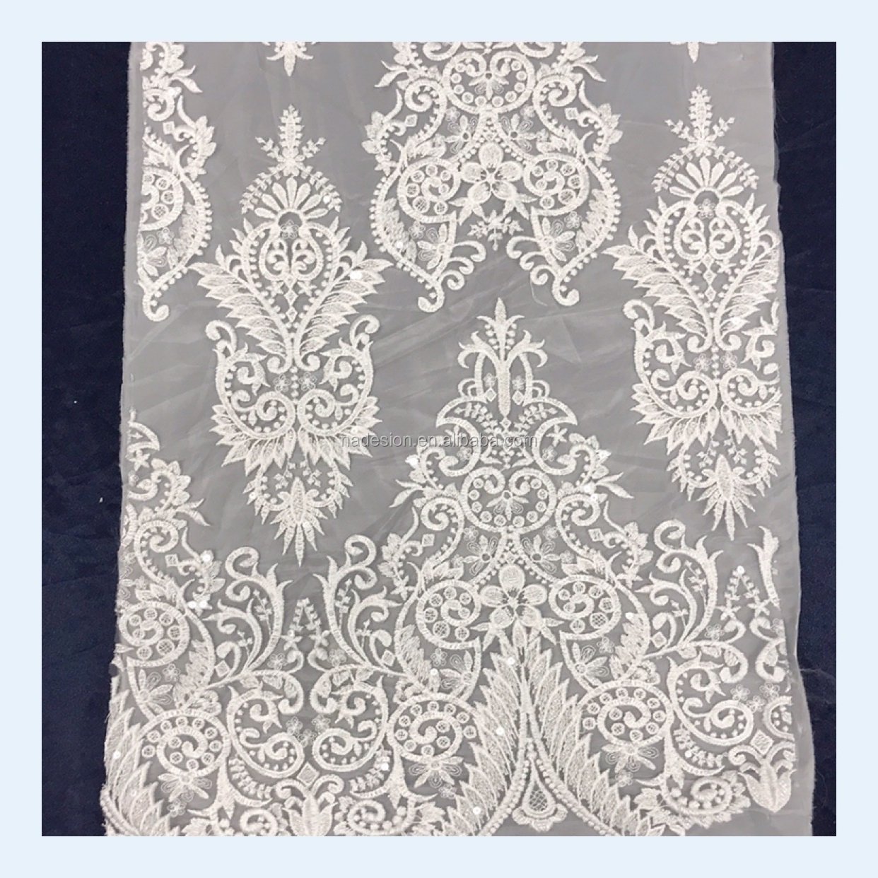 New wholesale white sequins beaded embroidery lace. Bridal gown sparkling sequins beaded lace fabric.