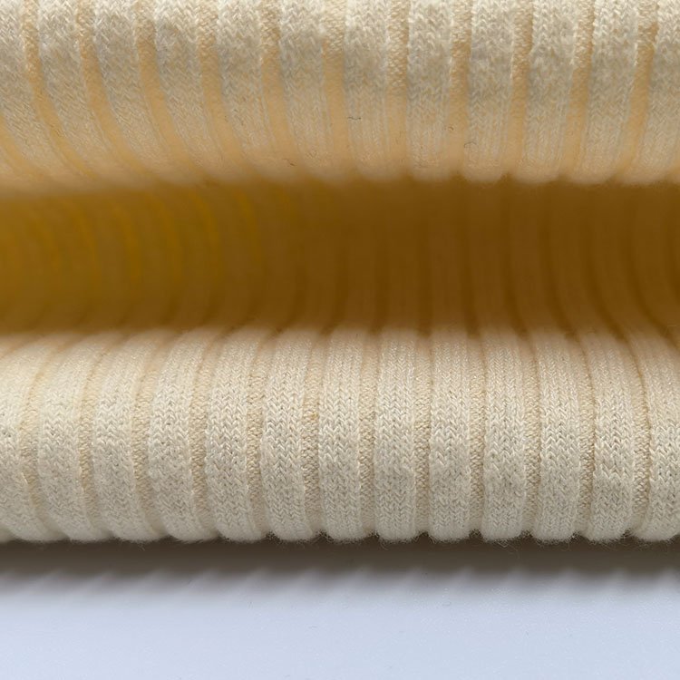 Eco-friendly 285gsm cream-coloured 66.4%cotton 28.6%polyester 5%spandex cvc ribbed fabric for garment