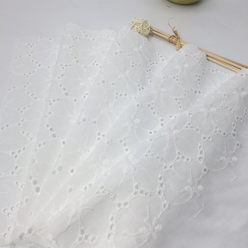 China Manufacturer Wholesale Floral Embroidery Lace Fabric White Eyelet Embroidery Cotton Fabric For Women Dress