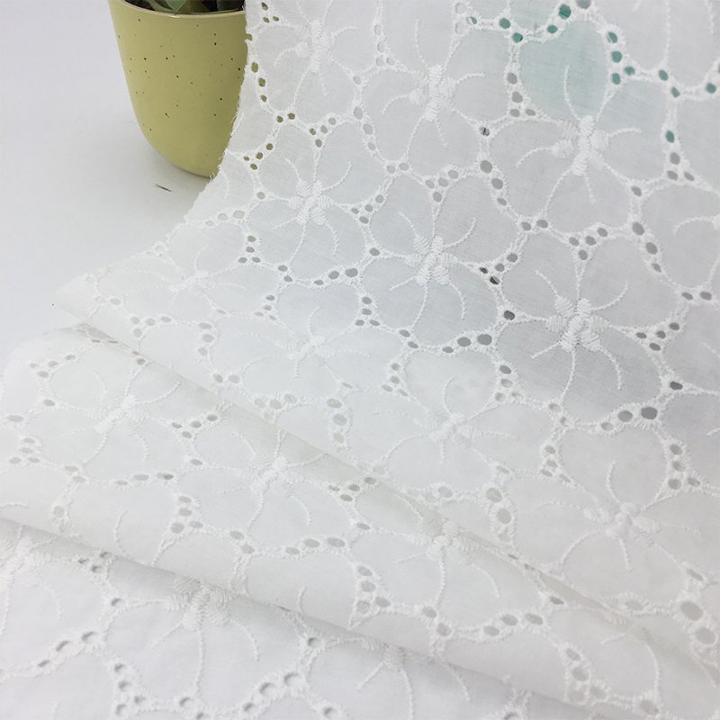 China Manufacturer Wholesale Floral Embroidery Lace Fabric White Eyelet Embroidery Cotton Fabric For Women Dress