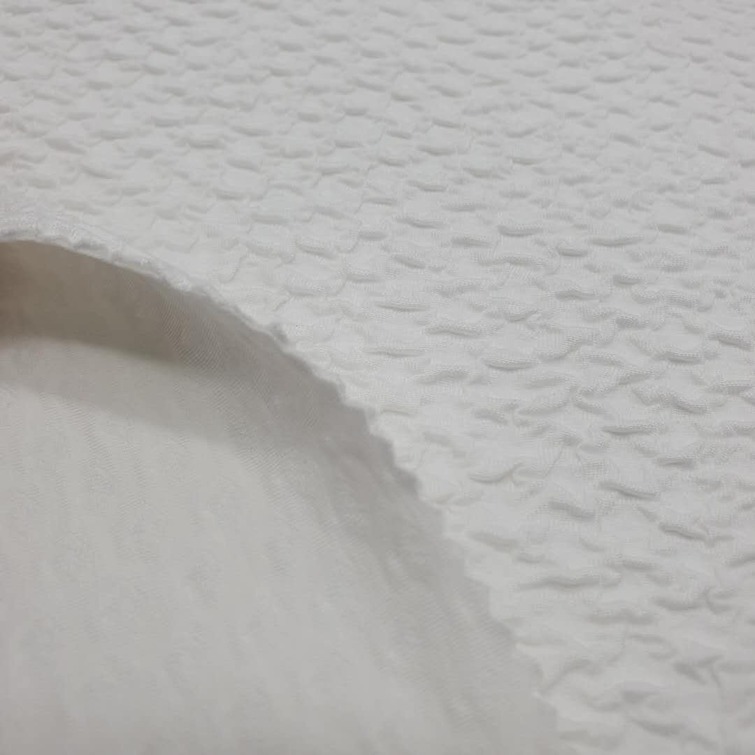 White color high quality knitted high stretch pleated crinkle seersucker ribs jacquard fabric for swimwear dress garments sports