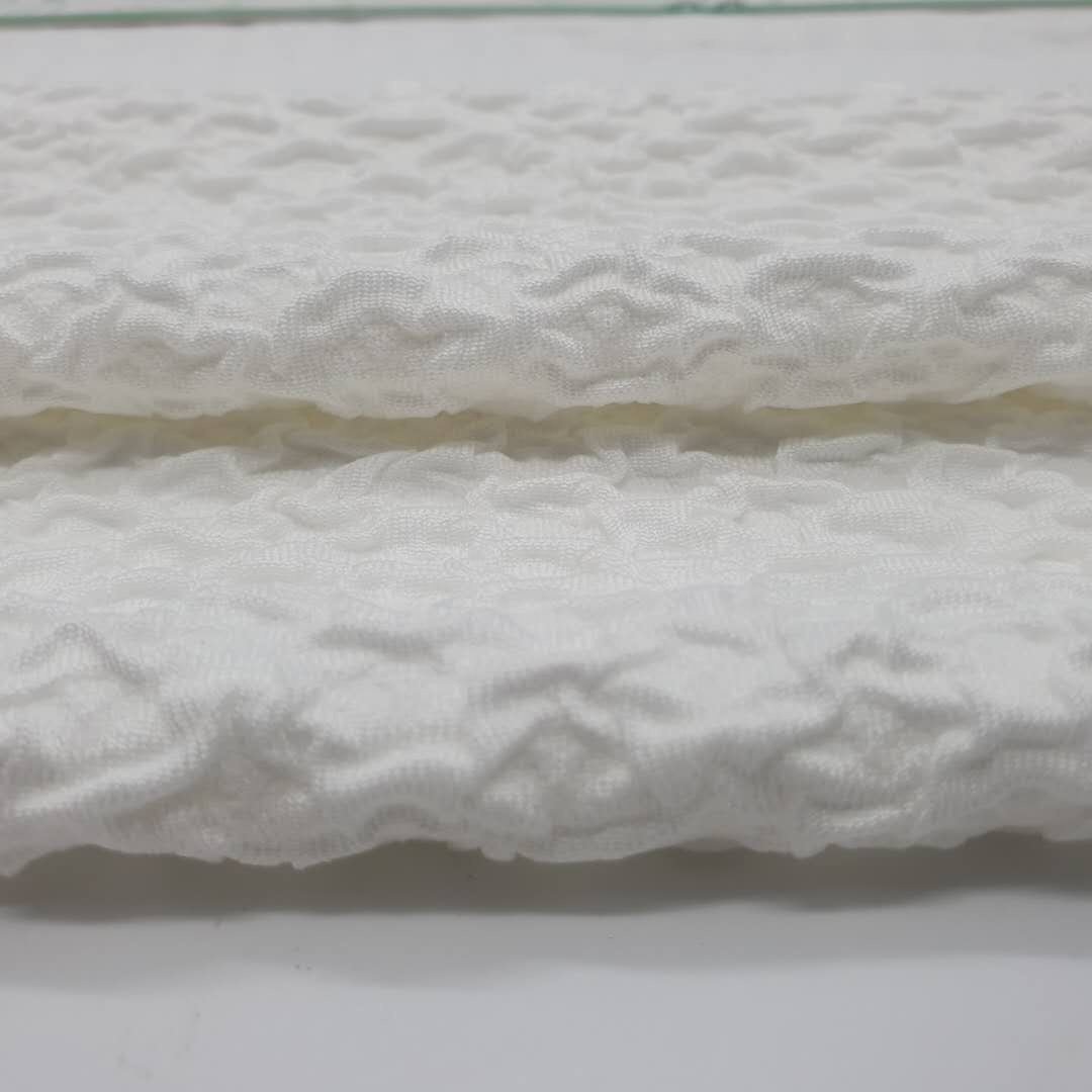 White color high quality knitted high stretch pleated crinkle seersucker ribs jacquard fabric for swimwear dress garments sports
