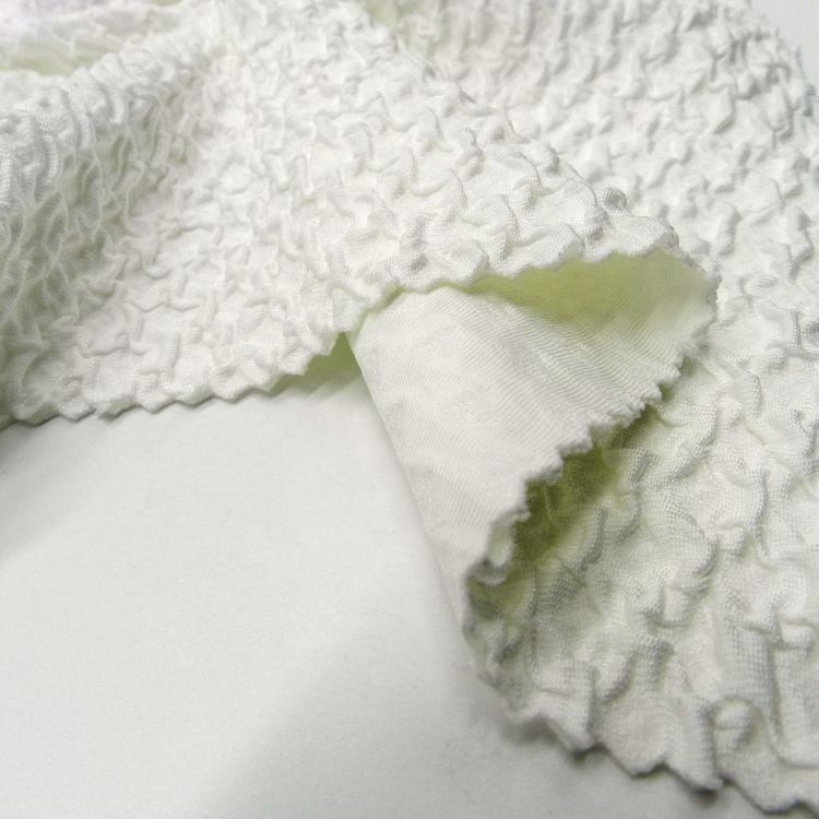 White color high quality knitted high stretch pleated crinkle seersucker ribs jacquard fabric for swimwear dress garments sports