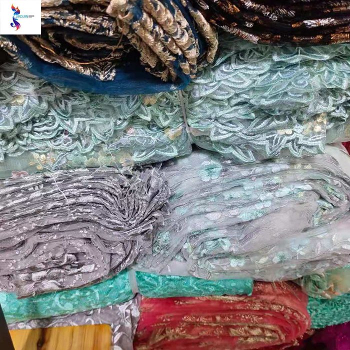 Wholesale big quantity kilo price mesh flat embroidery stock fabrics