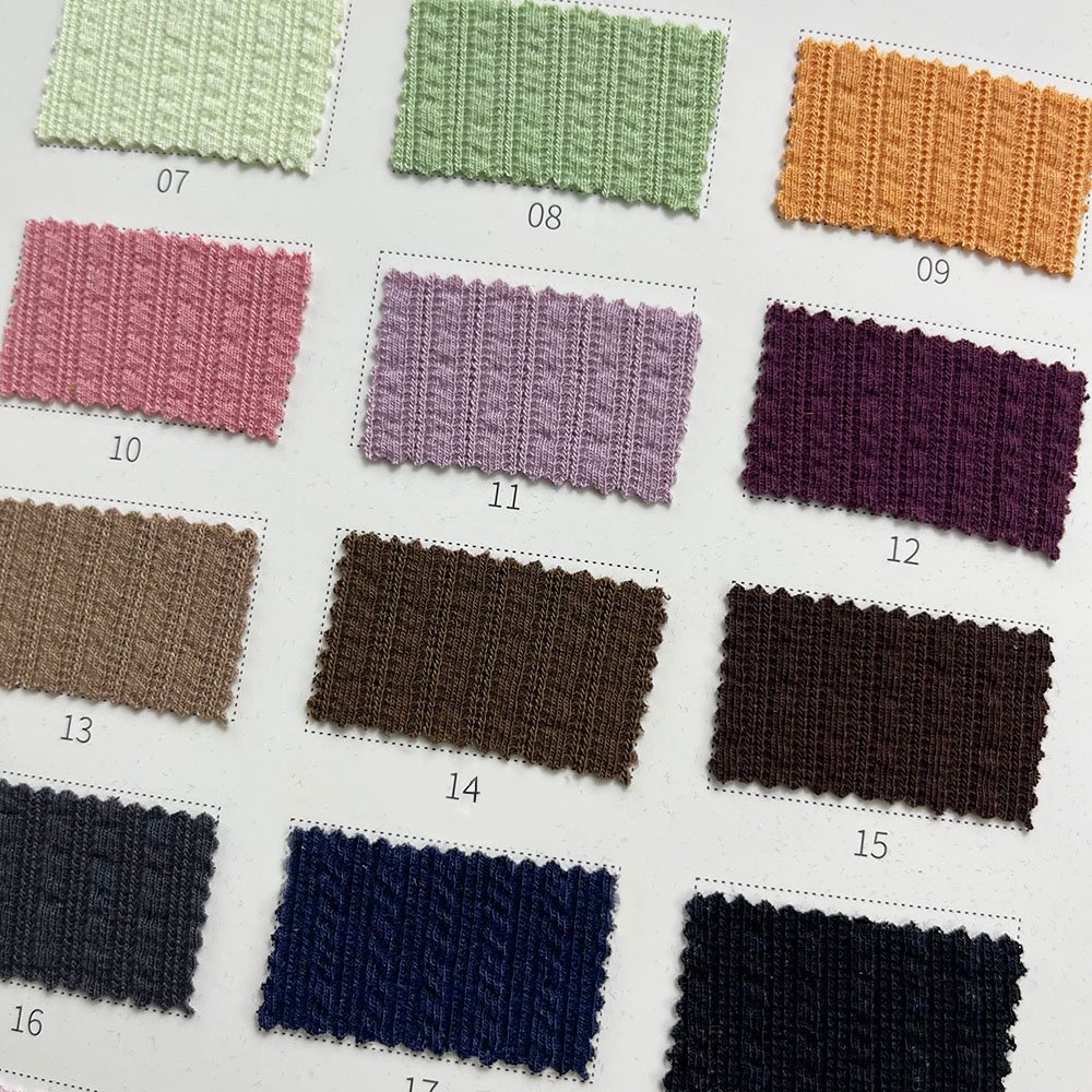 Wholesale ribbed 66.5% polyester 28.5% rayon 5% spandex 260g TR jacquard rib knitted fabric for Women tops