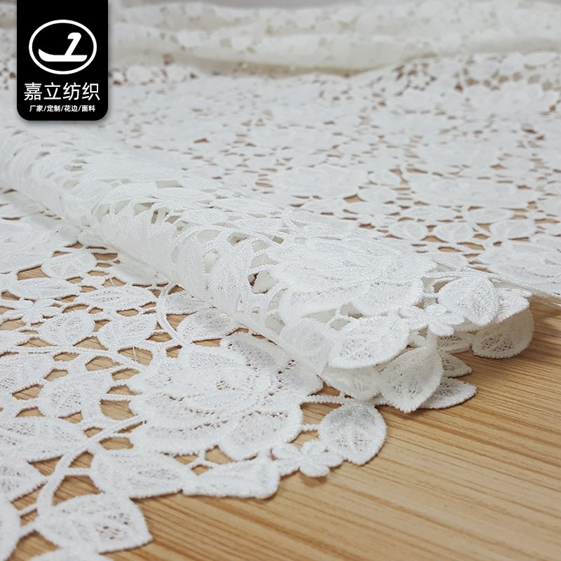High quality white soft hollow water-soluble polyester 3D flower embroidery lace fabric for women
