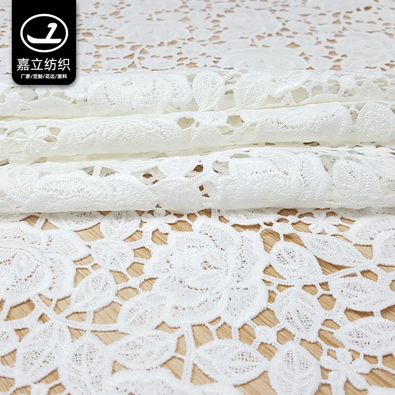 High quality white soft hollow water-soluble polyester 3D flower embroidery lace fabric for women