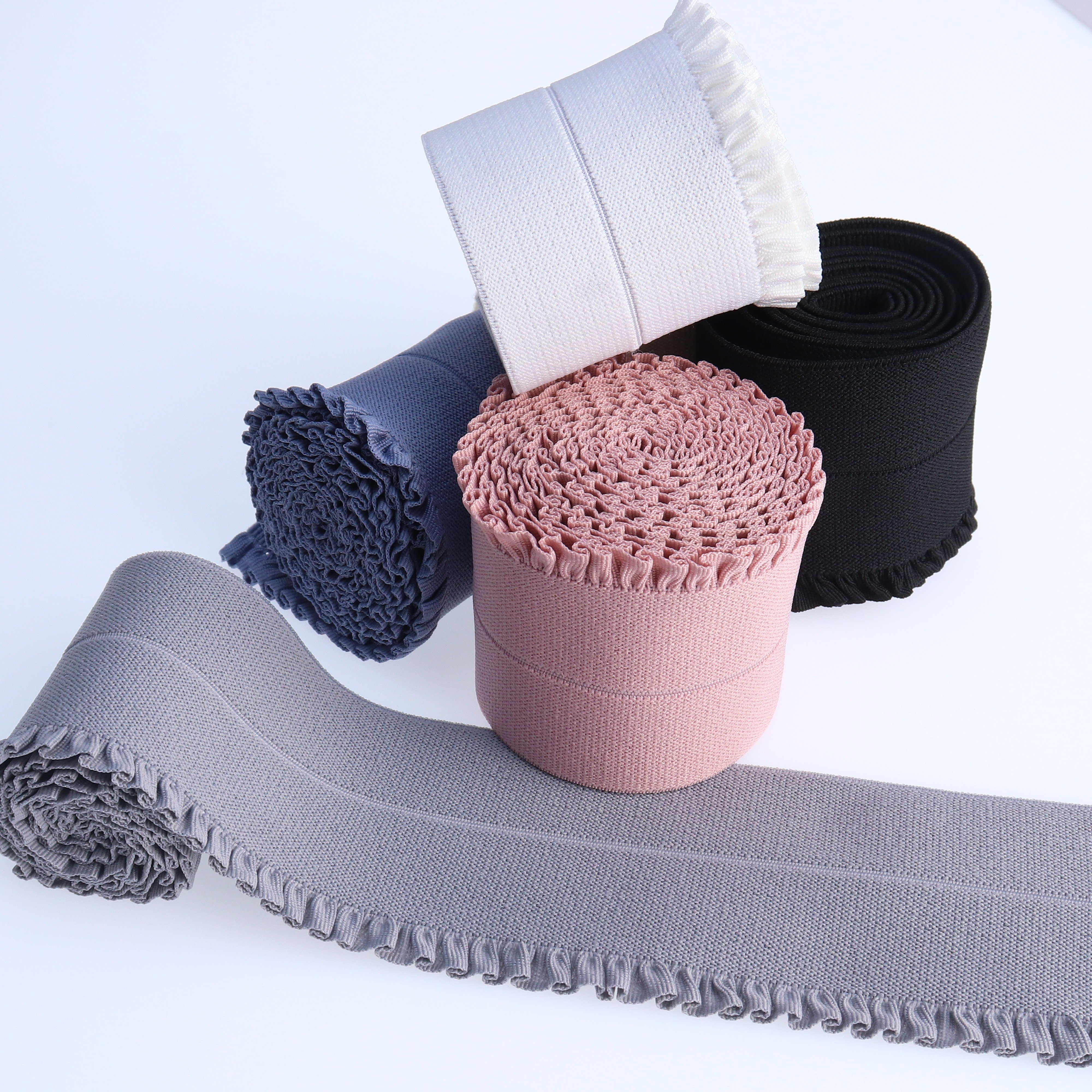 Wholesale of 5.5cm colored elastic wooden ear lace pants with folded waistband and elastic binding by manufacturers