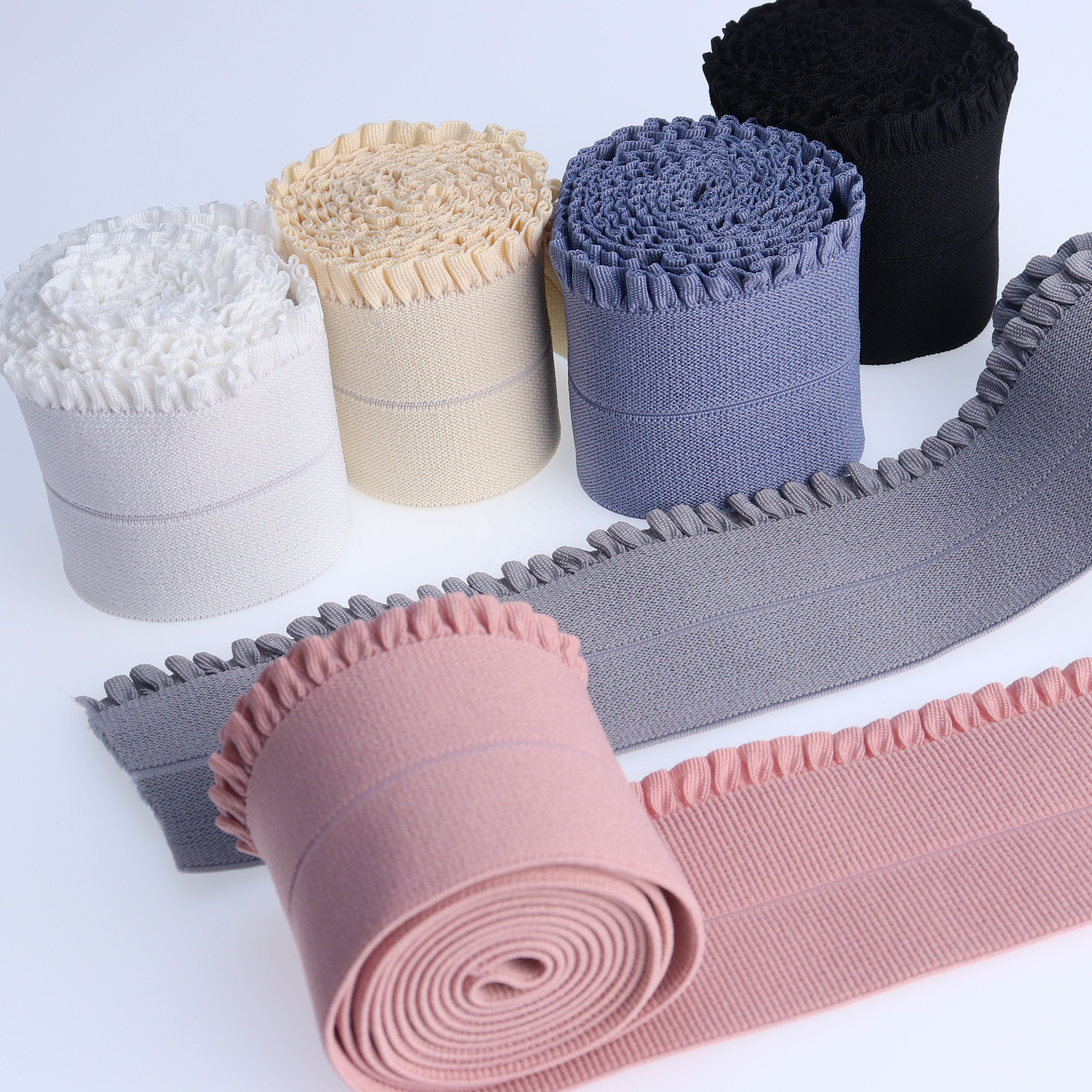 Wholesale of 5.5cm colored elastic wooden ear lace pants with folded waistband and elastic binding by manufacturers